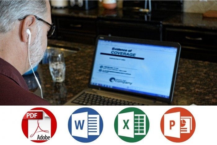 Image of a blind man sitting in front of his computer with headphones on listening to accessible documents.