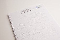 Image showing a sample braille mortgage statement with GBC comb binding by Braille Works