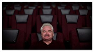 Jay Forry sitting in a movie theater