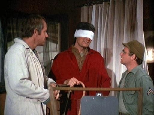 Hawkeye with bandages over his eyes during M*A*S*H Season 5 - Episode 99