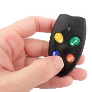Hand holding a key fob with panic button