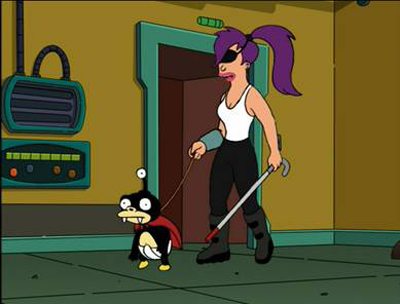 Leela walking with a white-cane while wearing a patch over her eye