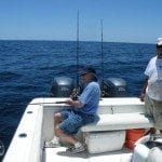 Image showing Lou Fioritto deep sea fishing on a boat in the Pacific Ocean