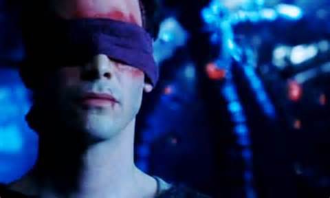 Neo wearing a blindfold to cover his wounded eyes after being blinded by Agent Smith near the end of Matrix Revolutions