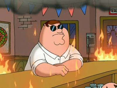 Peter Griffin sitting at the Drunken Clam bar while a fire rages around him.