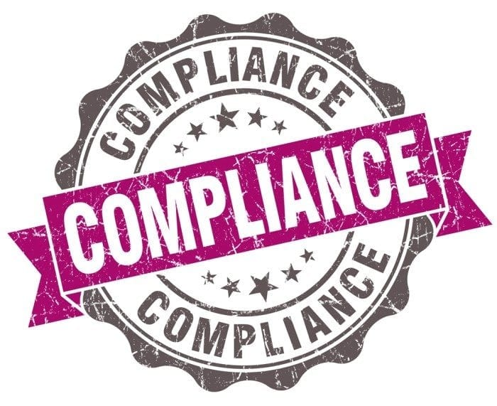 Vintage seal with the word "Compliance" displayed