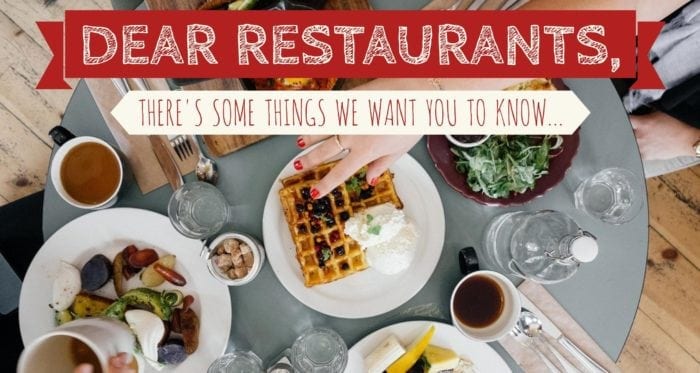 Overhead view of a restaurant table with a lot of breakfast items.