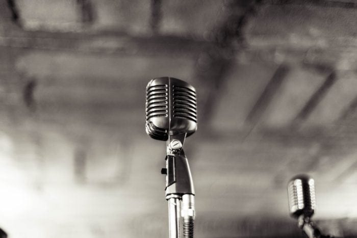 Black and white photo of two microphones