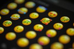 various emoji faces on a screen