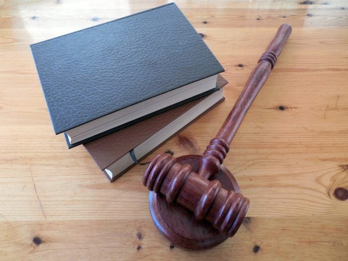 ADA Lawsuits are on the rise - gavel and books