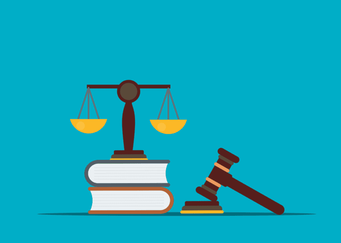 Icon of legal scale on top of 2 books next to a gavel