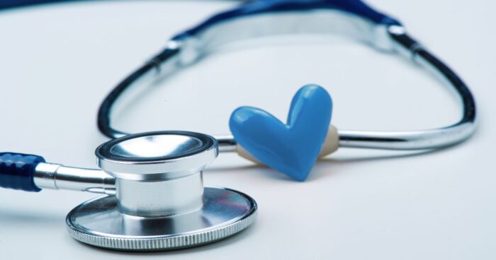 Close up of a stethoscope and decorative heart